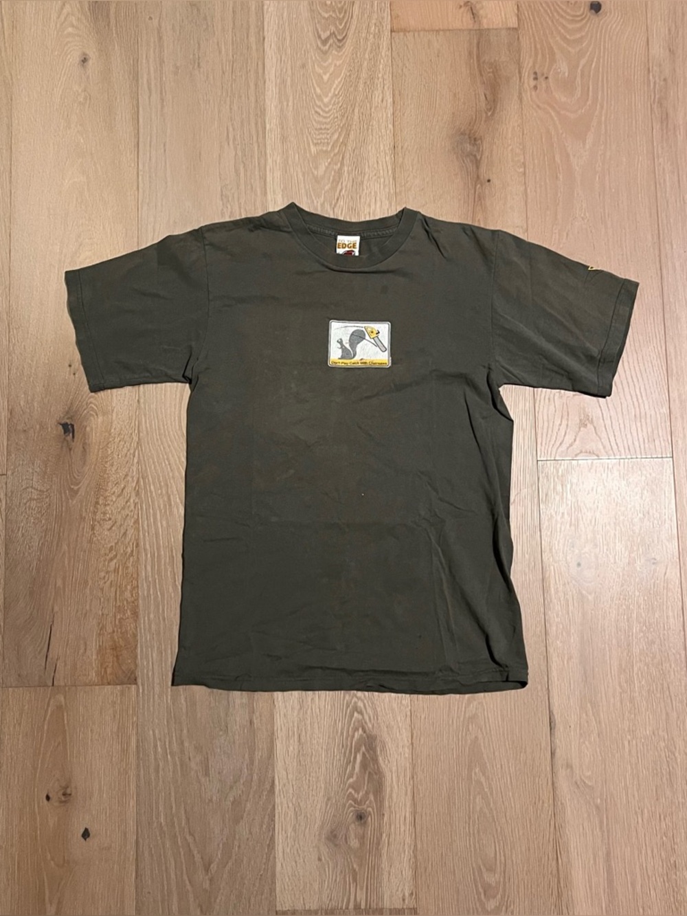Vintage 2002 pacsun Graphic Tee Green Chainsaw Catch Print Humor